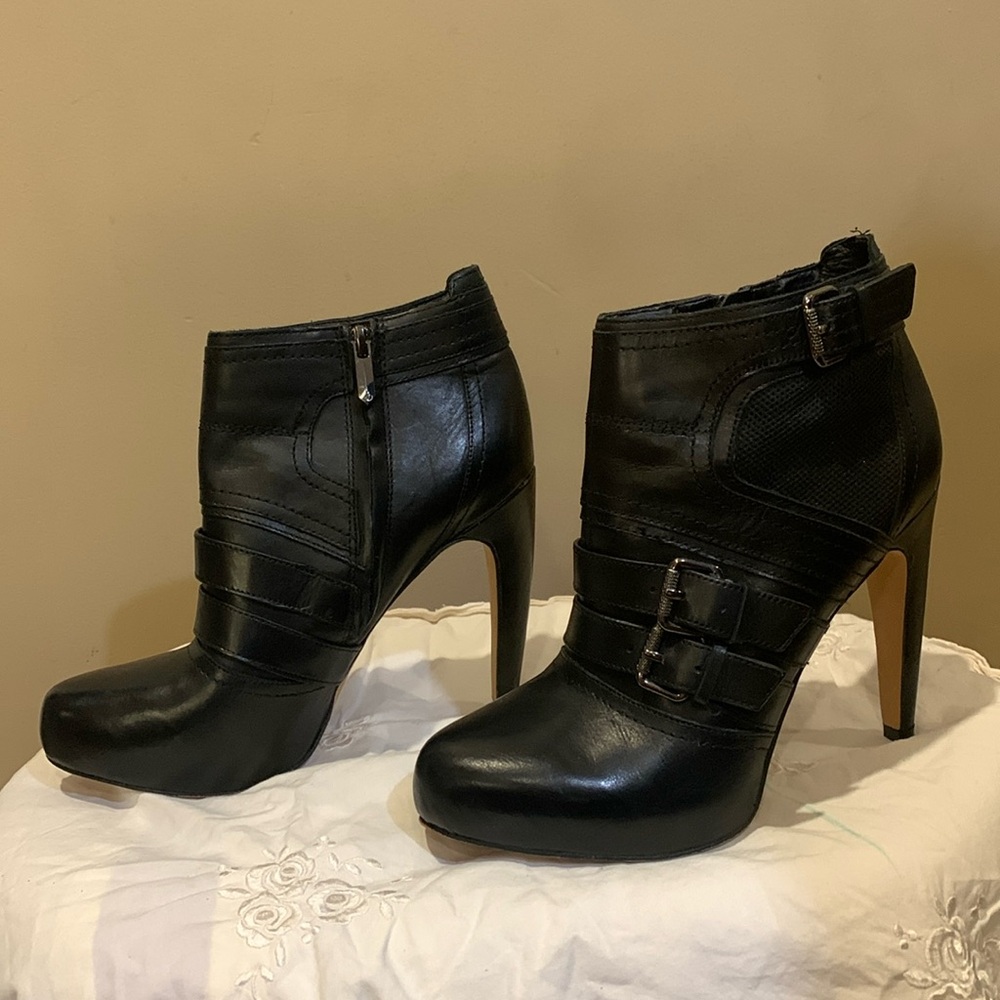 Black Sam Edelman booties with buckles. Heel hight 5 inches. Size: 7 1/2
